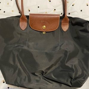 LONGCHAMP GUN METAL COLOR TOTE. Perfect condition.. snaps to fold.. zip to close